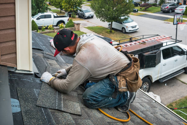 Professional Roof Replacement technician working in Minier, IL
